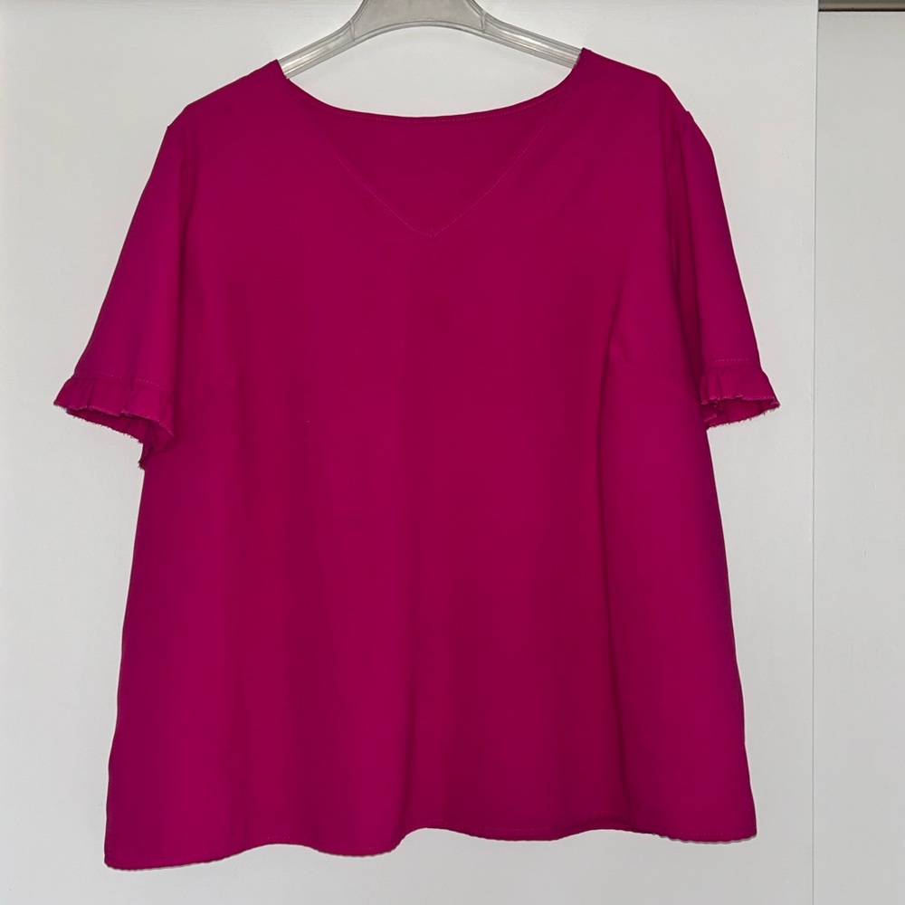 Pink v-neck short sleeve blouse with ruffle trim sleeves